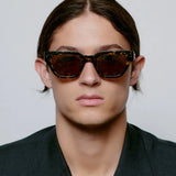 Akiniai A.KJAERBEDE KAWS BLACK YELLOW TORTOISE