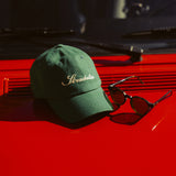 Script Green Hat