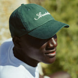 Script Green Hat