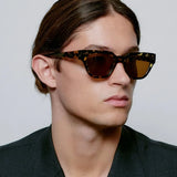 Akiniai A.KJAERBEDE KAWS BLACK YELLOW TORTOISE
