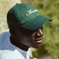 STRADALIA SCRIPT GREEN HAT